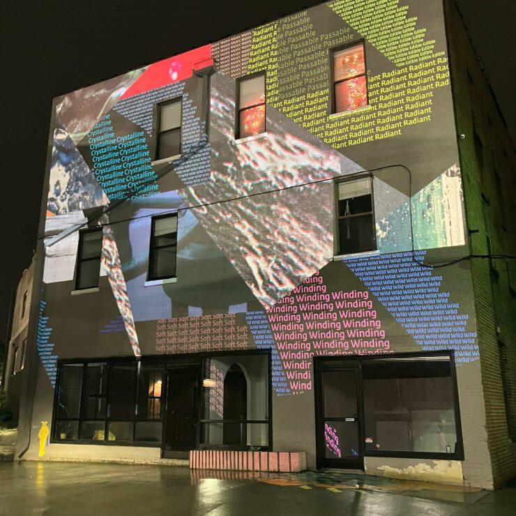 A photo of a projection on a building. 