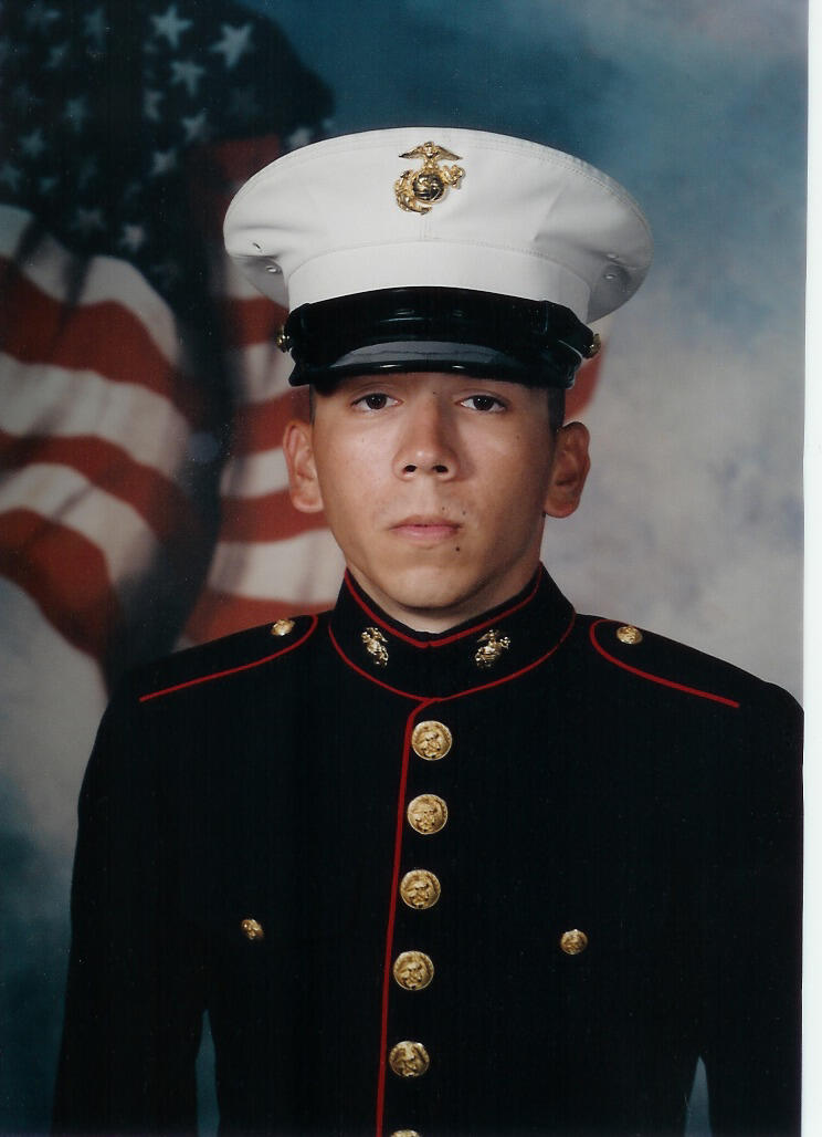 Karl Linn joined the Marines as a reservist in the delayed entry program in June 2002.