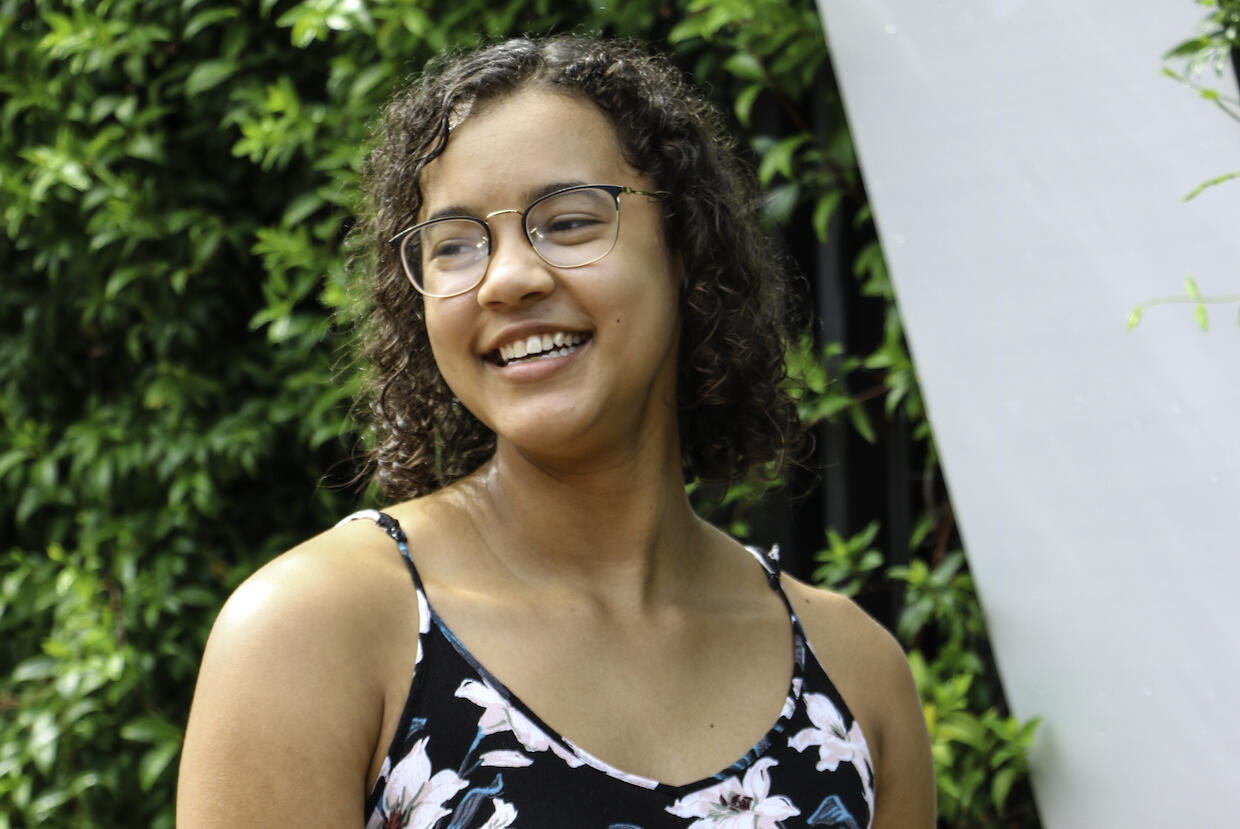 Raven Witherspoon standing outside on V C U's Monroe Park Campus. 