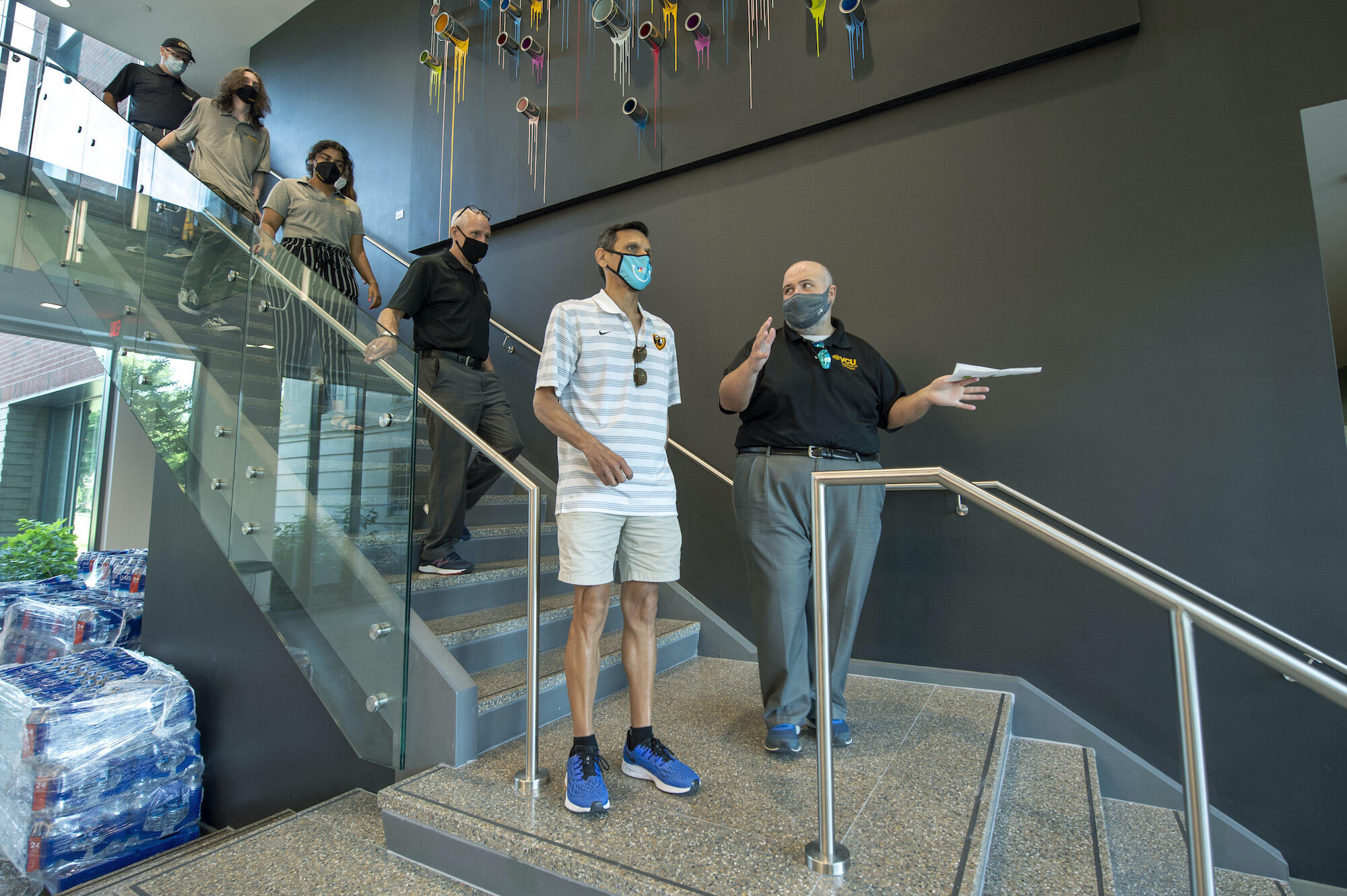 VCU administrators inside Gladding Residence Center