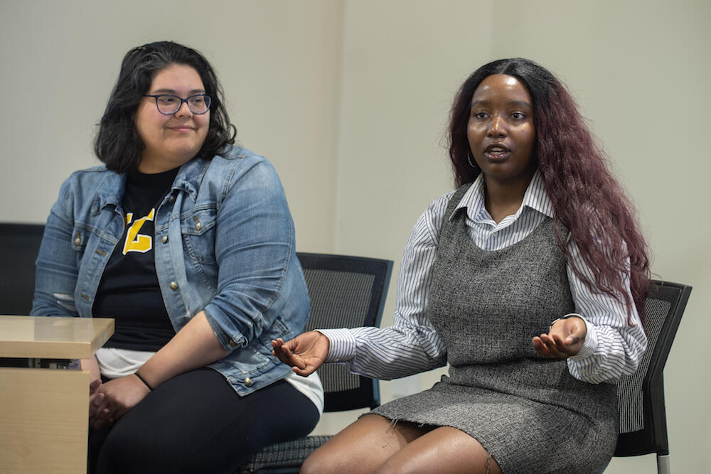 Baldacci Student Experiential Learning Fund recipients Camila Tirado, a psychology major, who will present her research at conferences in California and Florida this summer, and Christela Niyungeko, who will travel to East Africa for a program focused on democracy and development in the region and Africa in general. (Photo by Kevin Morley, University Relations)