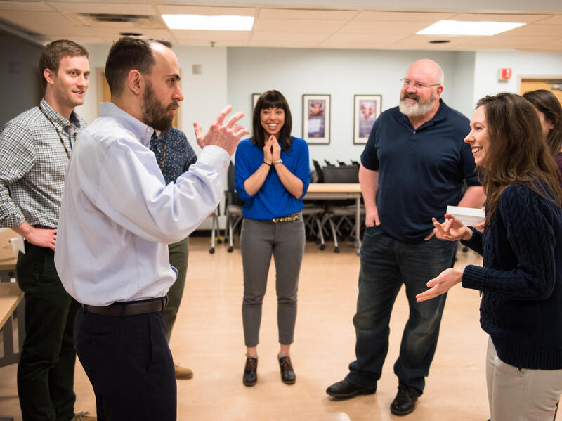 a group of people standing in a circle