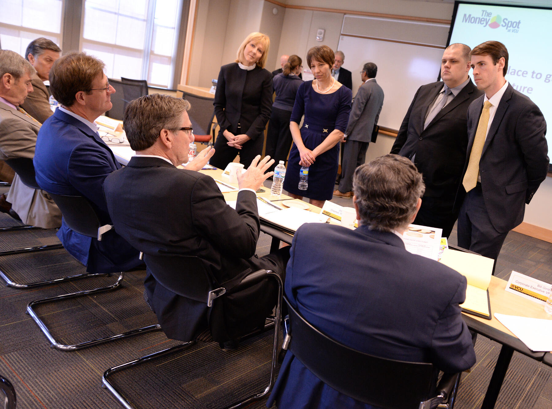 The EPIC Learning team chats with the judges after their presentation.