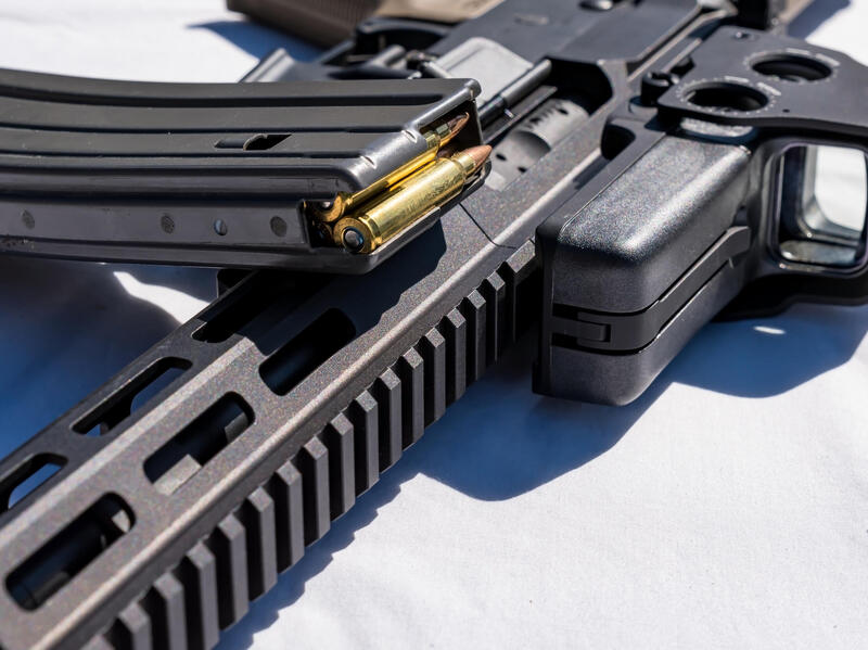 A gun lying on its side.