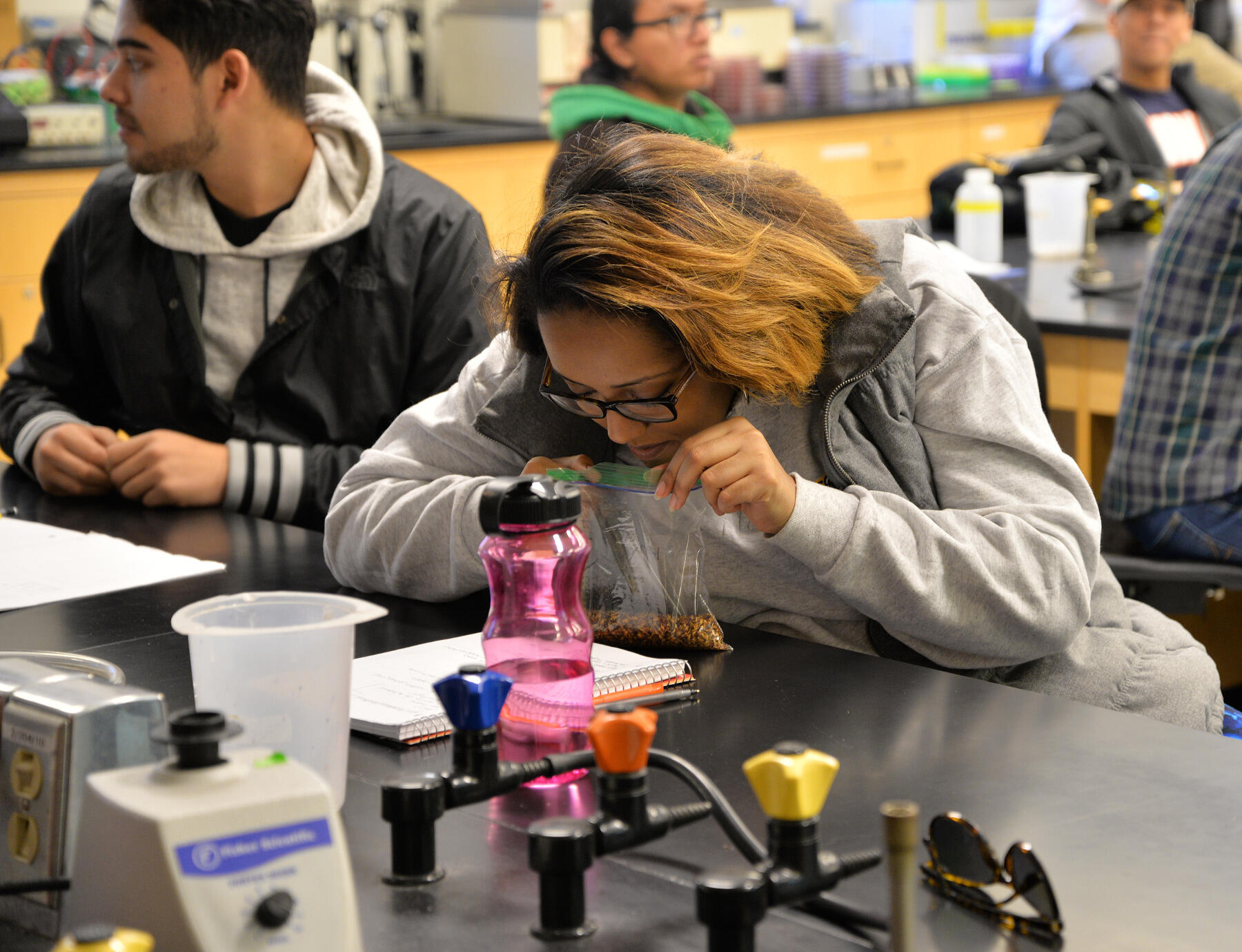 VCU students check out samples of malt and hops during a presentation by Ardent Craft Ales.