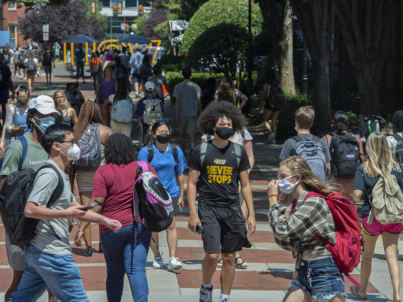 Students on the way to and from class on the first day of the fall semester.