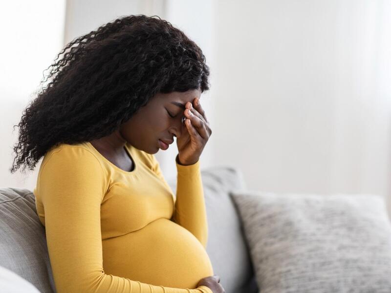 pregnant woman struggling with stress