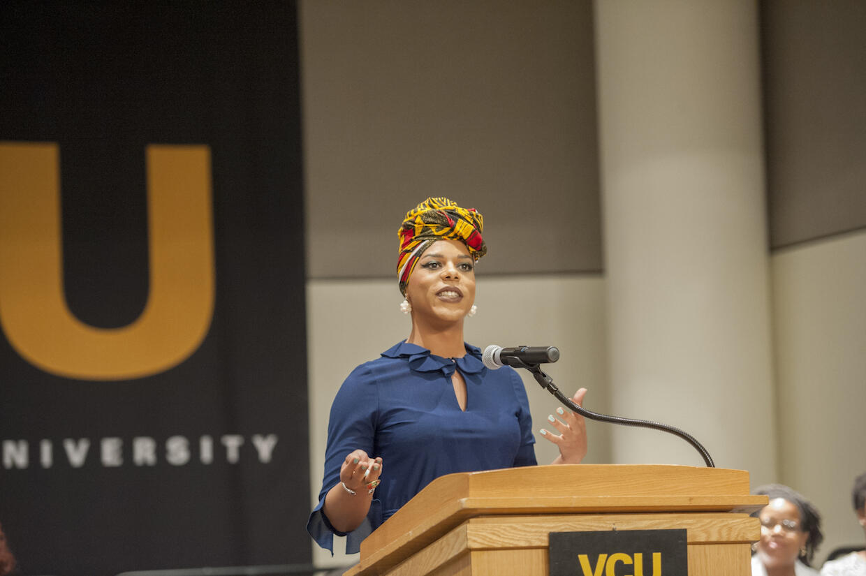 Austin Higgs addresses the crowd after receiving the PACME staff award. (Tom Kojcsich)