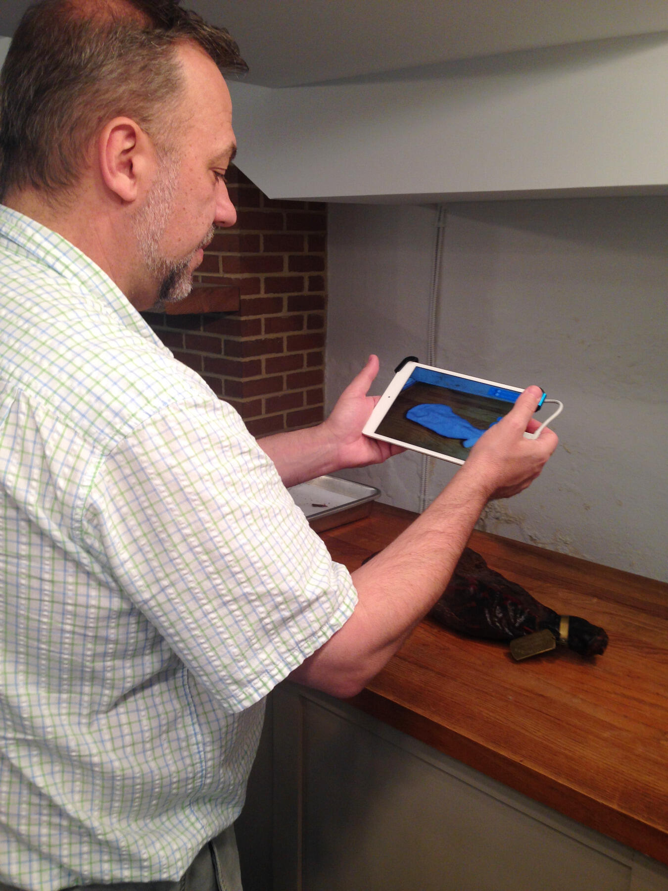 Means checks out the world's oldest ham, which dates to 1902.
