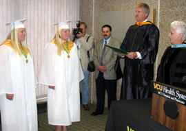 The Prince George School System held a special graduation ceremony at the VCU Medical Center for twins Lindsay (top and above left) and Lauren Vance so their father, Robbie (top center), could attend. 
