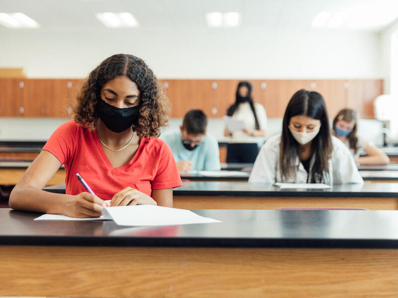 Students seated in a classroom.
