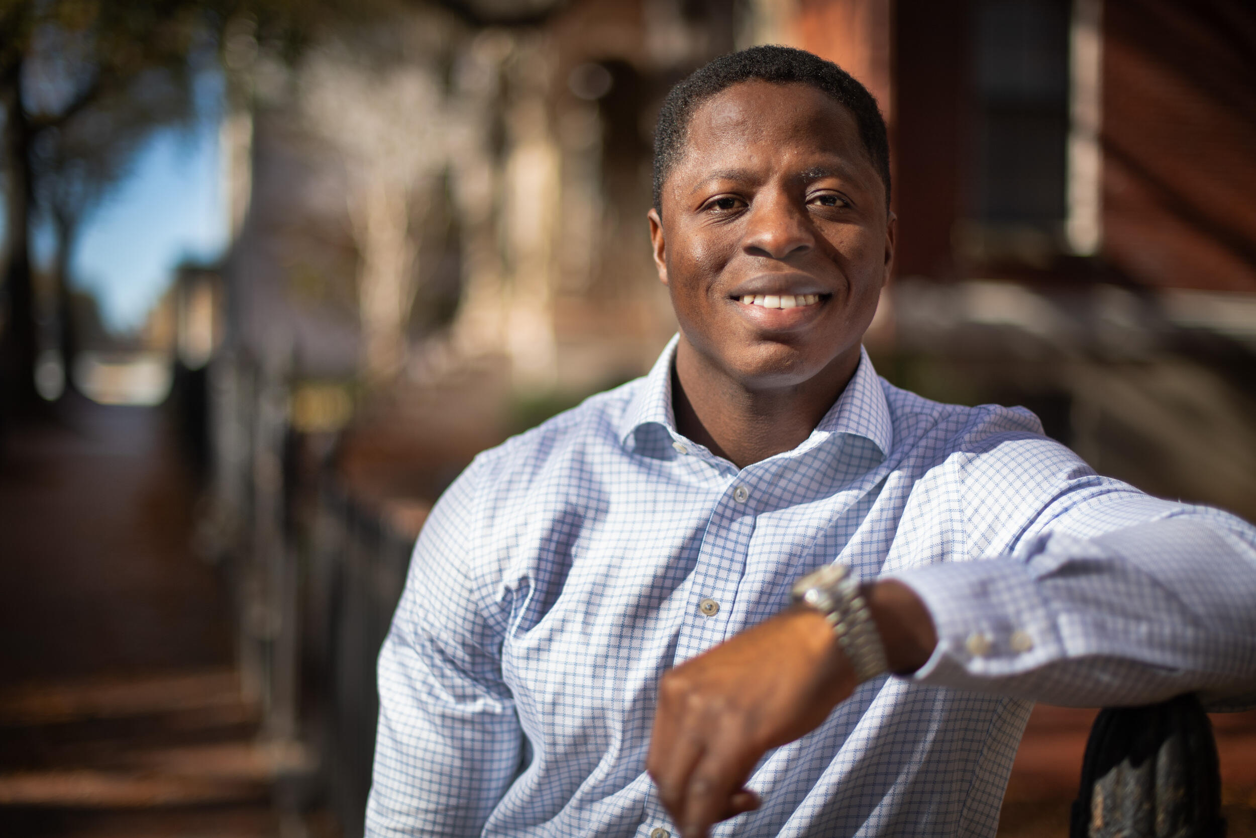 A photo of a man from the chest up. 