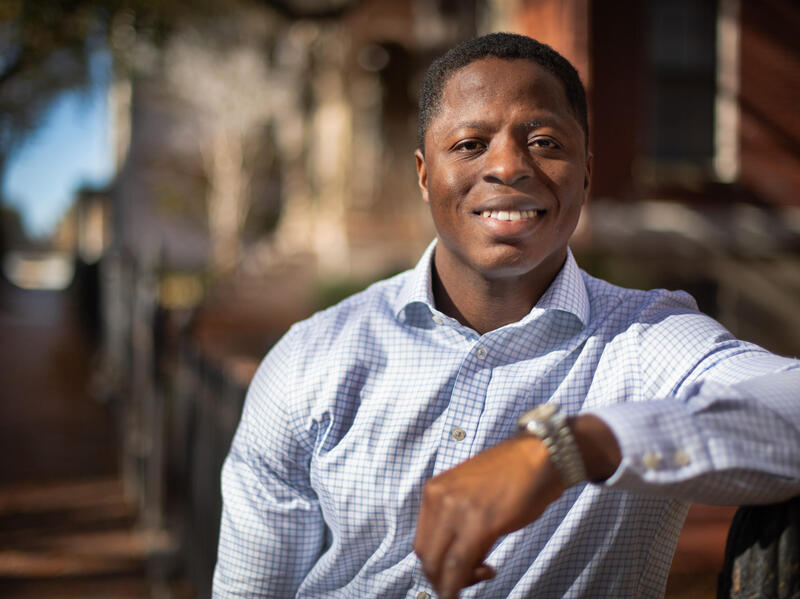 A photo of a man from the chest up. 