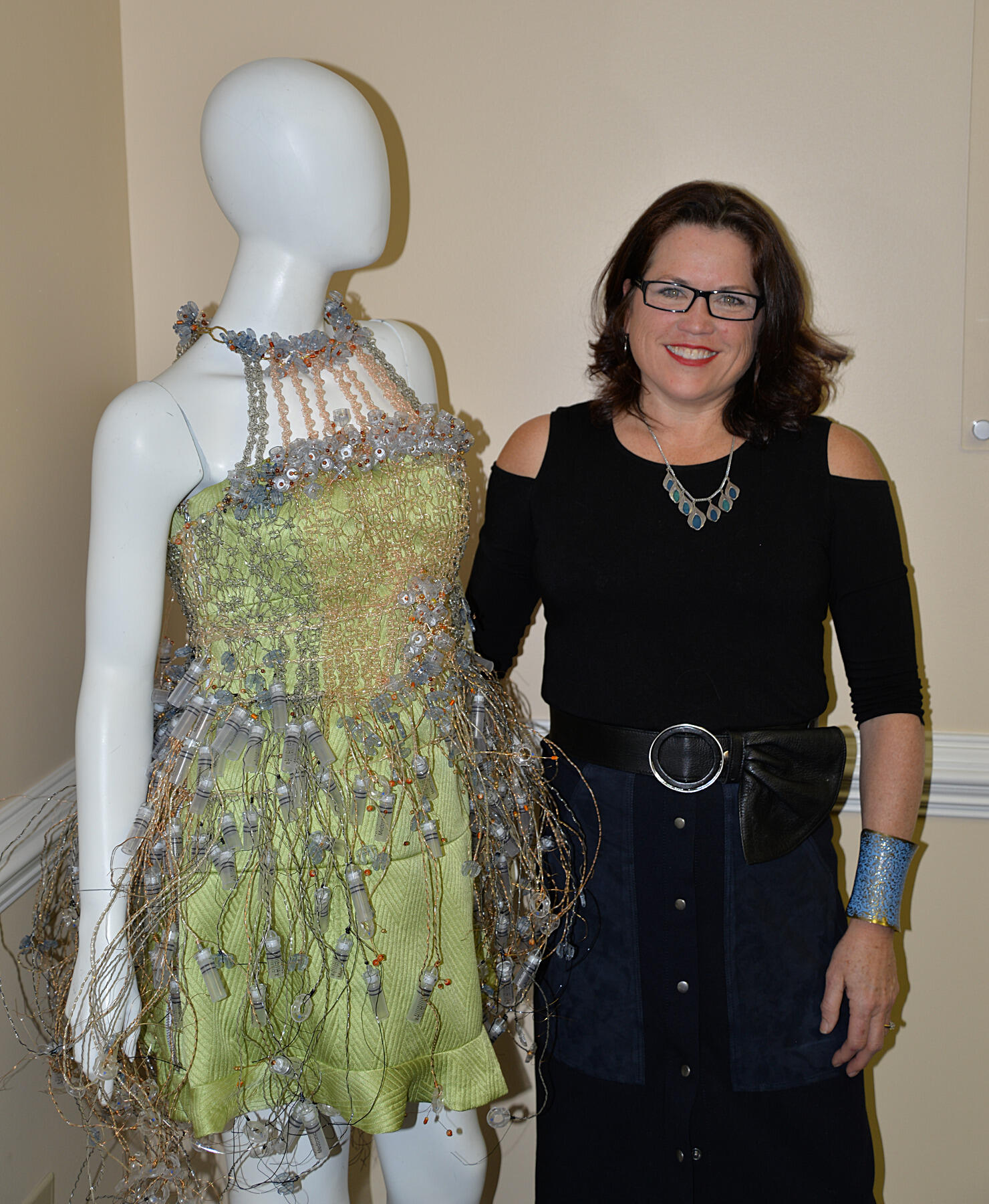 Mo Regulinski stands with her piece “Perspective.”
<br>Leha Byrd/University Public Affairs