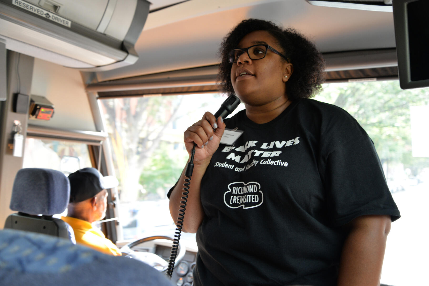 Stephanie G. Odera, assistant professor in teaching at the School of Social Work, narrates a bus tour of Richmond that included public housing developments Gilpin Court and Mosby Court, the Richmond Justice Center, Martin Luther King Jr. Middle School, Richmond Alternative School, and the Richmond Juvenile and Domestic Relations District Court.

