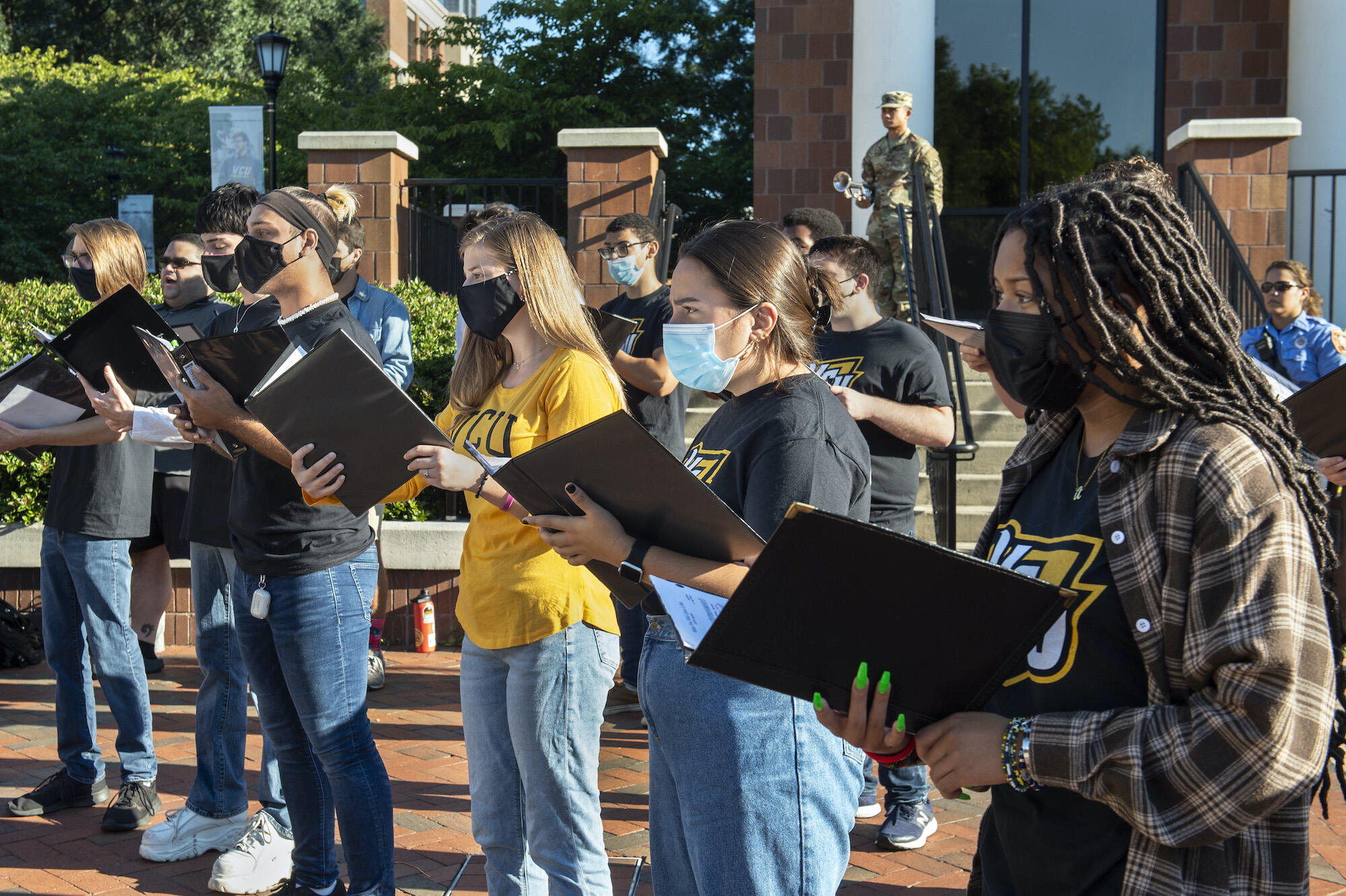 A choir sings at a 9/11 anniversary event.
