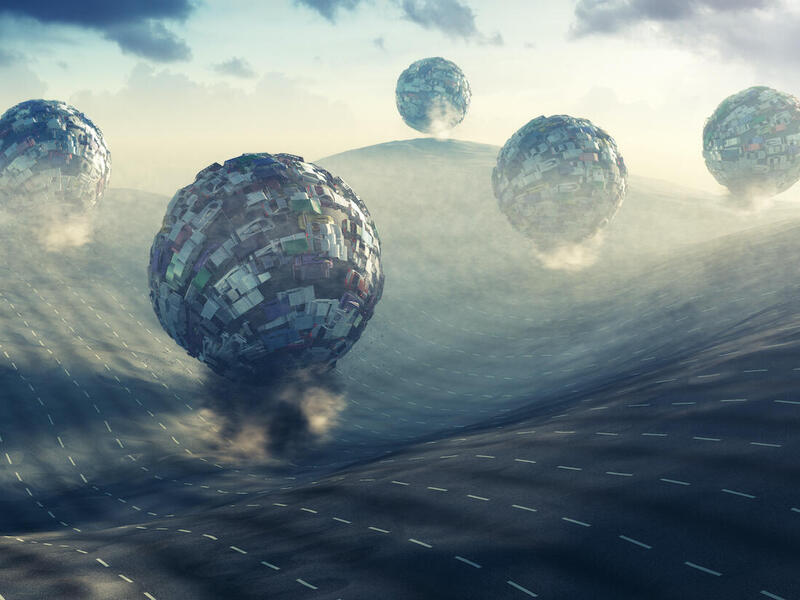 Artwork depicting spheres consisting of automobiles.