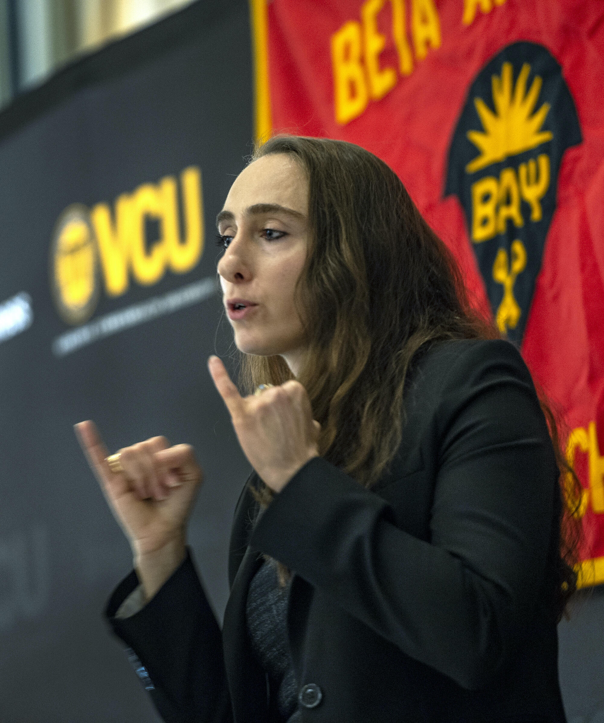 VCU School of Business alumna Cristina Childers speaking at a recent meeting of the VCU chapter of Beta Alpha Psi, an international honor organization for accounting students.