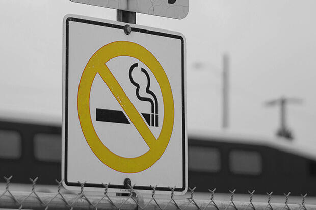 A no-smoking sign displaying a cigarette with a no symbol on top.