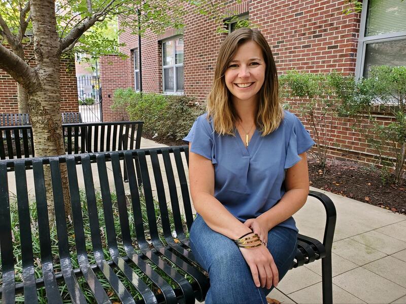 A woman sitting on a bench