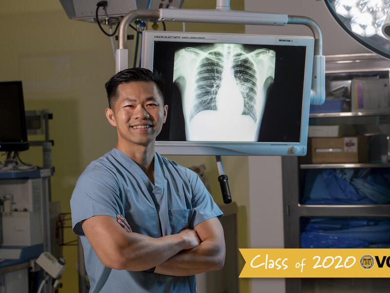 Jay Pham standing inside of an operating room.