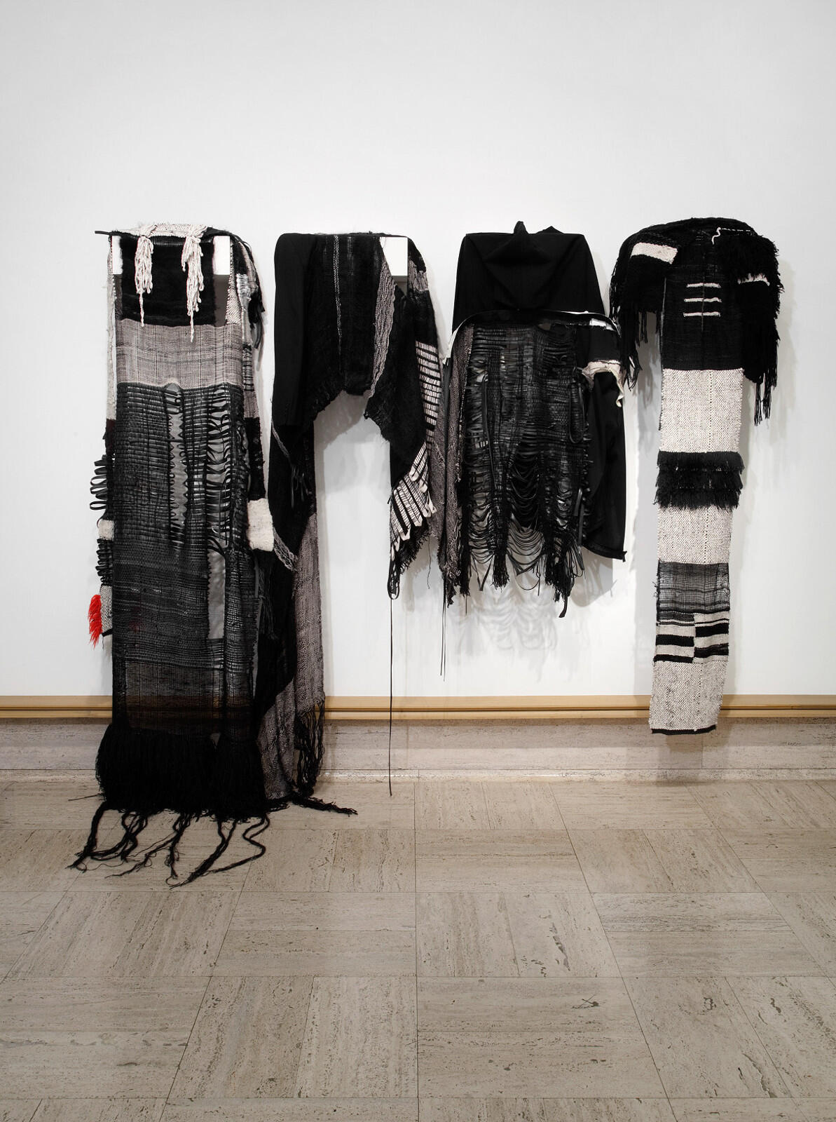 In "Ancestral Offerings," 2018 Fountainhead fellow Jeanne Medina presents a series of textiles embedded with codified language. This piece features mutable garments, performance and a sound track. (Photo courtesy VCU School of the Arts)