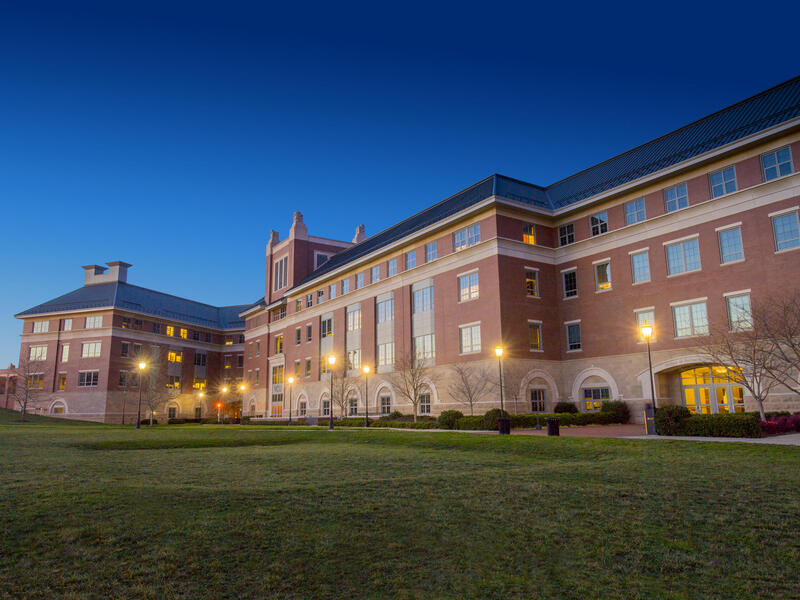 A photo of the outside of Snead Hall at dusk. 
