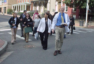 VCU School of Medicine students Sabina Amin and Judson Frye lead a tour for a group of prospective students during the first annual School of Medicine Open House. 

Photo courtesy of Mireille Truong, a VCU School of Medicine student