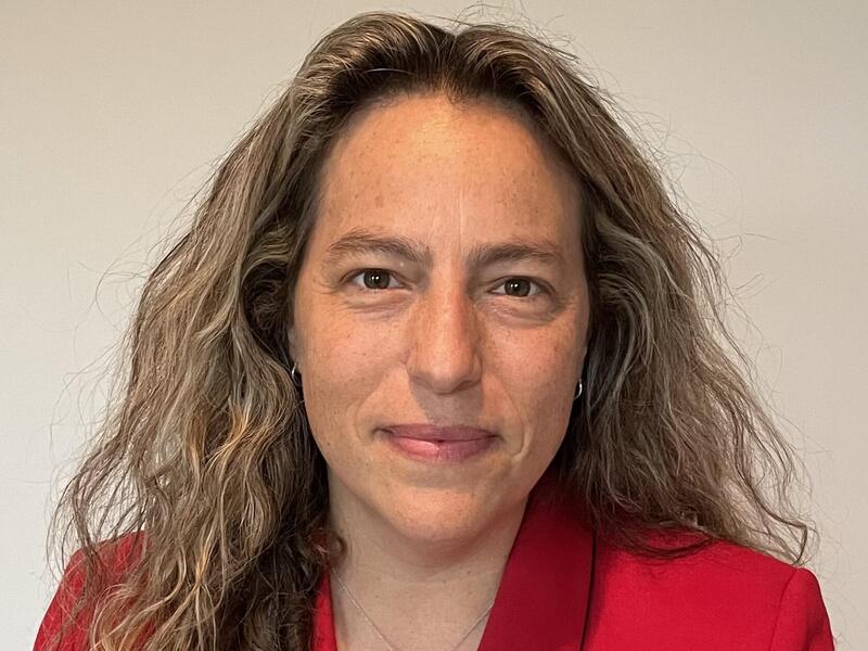 A photo of a woman from the shoulders up 