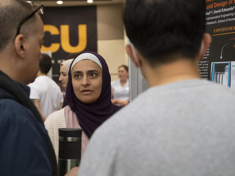 Three people talking together 