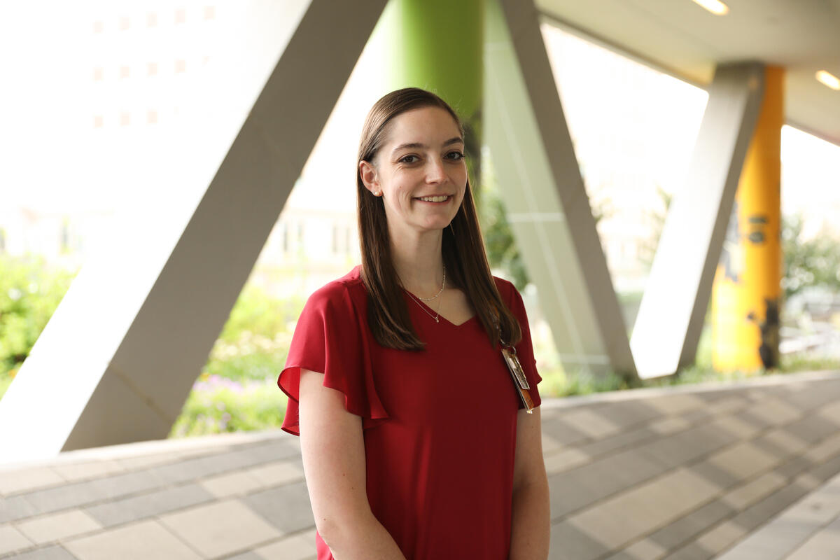 A photo of a woman from the chest up. 