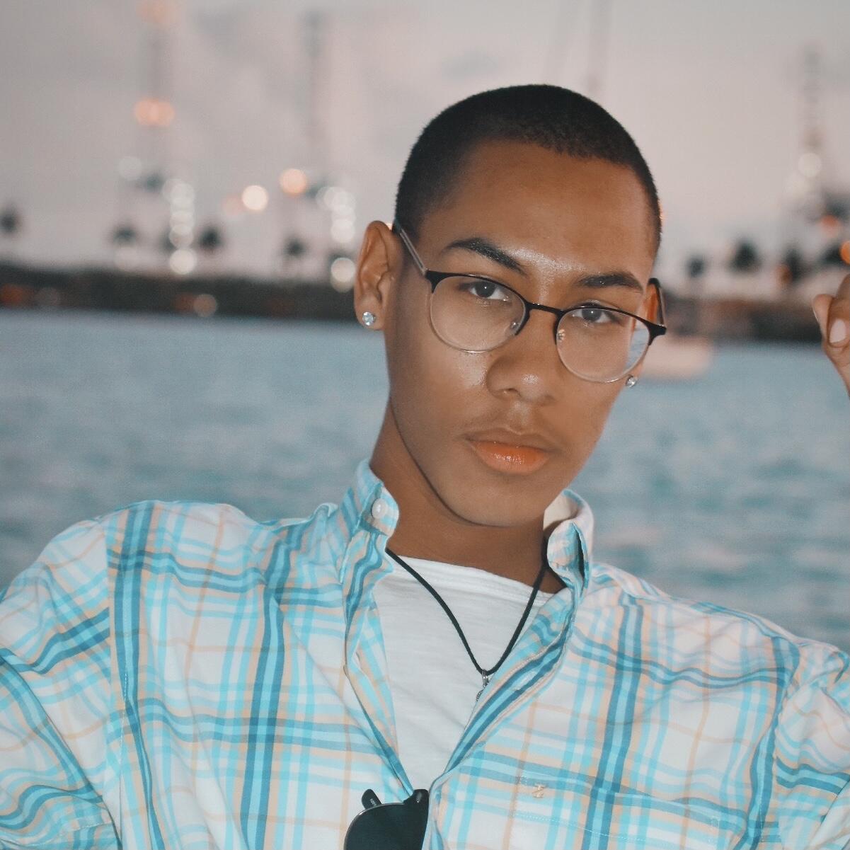 Portrait of man with ship in background