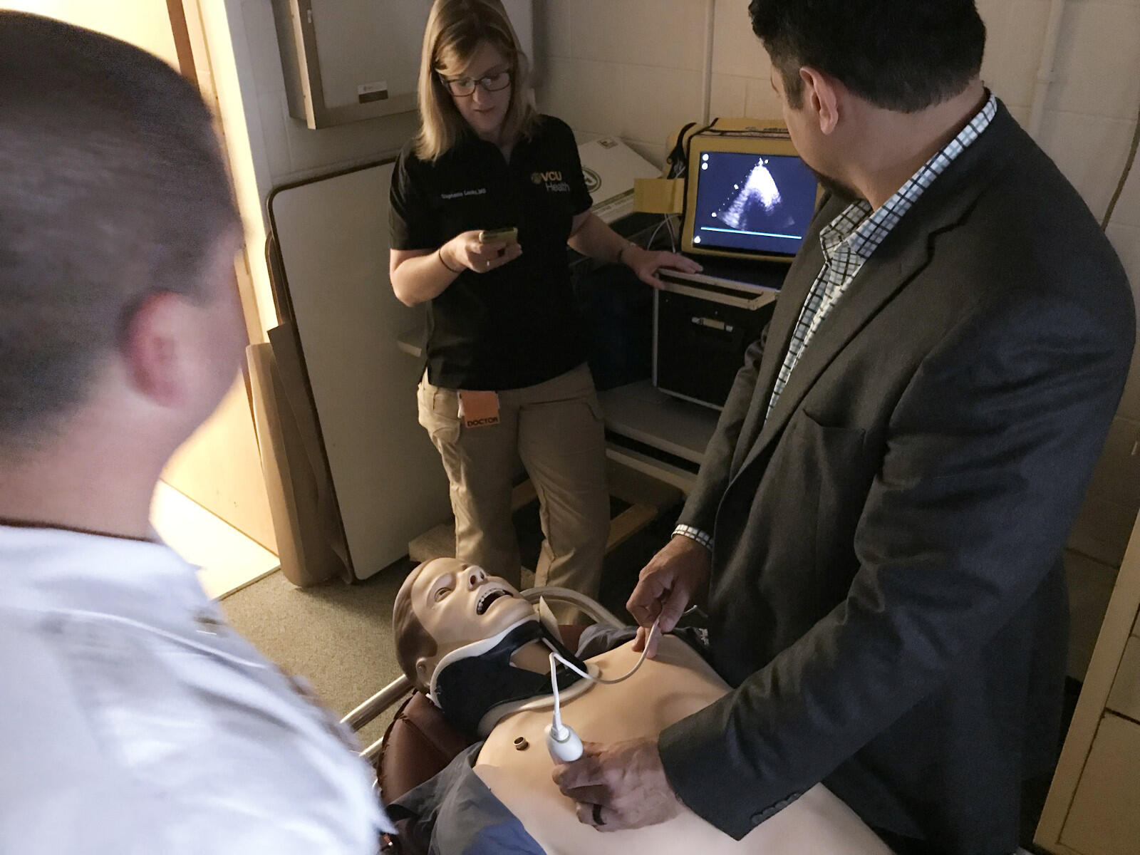 Stephanie Louka, M.D., EMS fellow and clinical instructor in the Department of Emergency Medicine, trains EMS personnel on using ultrasound as a pre-hospital care diagnostic tool.
