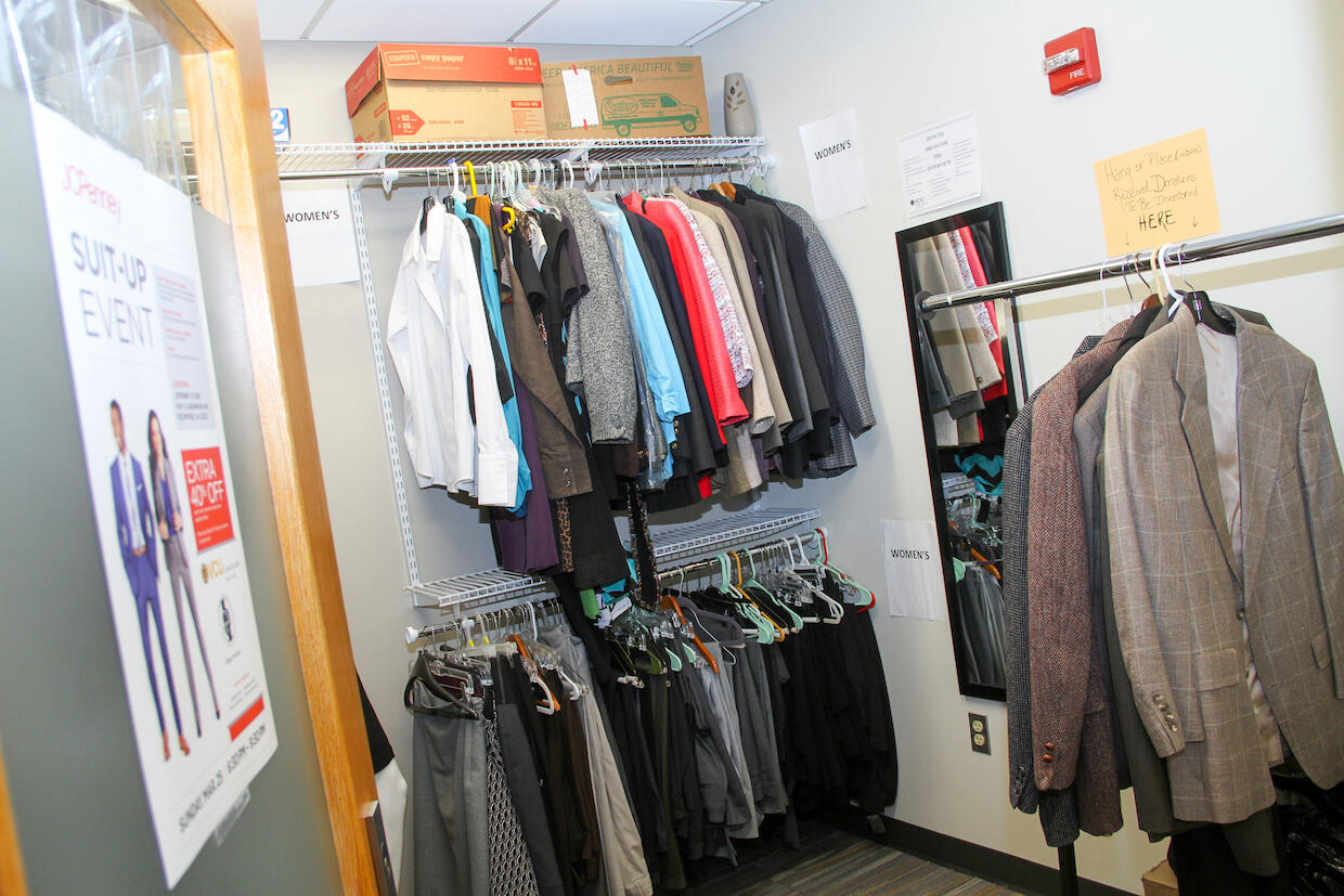 The "Suit Yourself" closet is a converted meeting room in Suite 143 of the University Student Commons and is stocked with donated professional clothing from individuals and businesses alike. (Photo credit: Pat Kane)