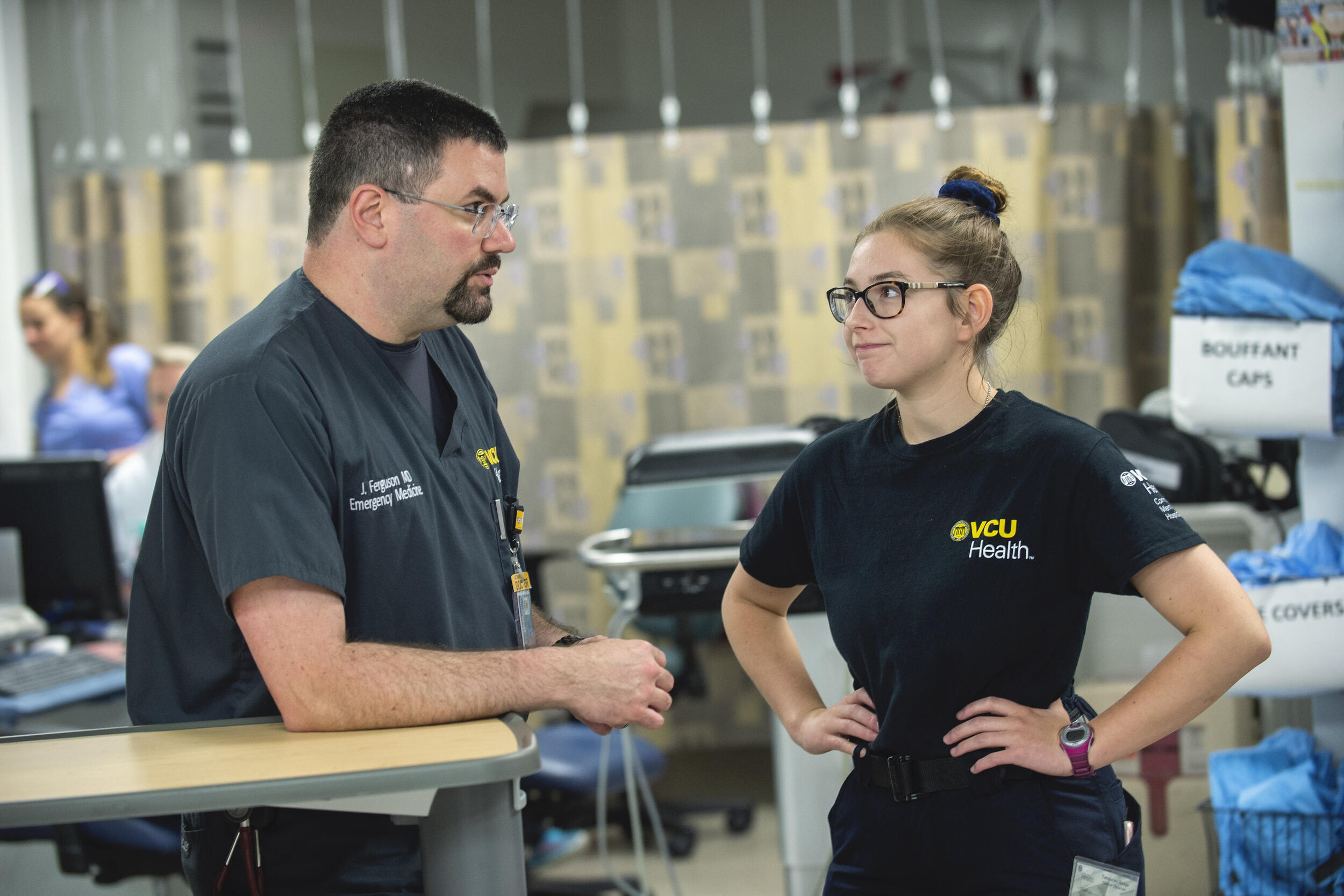 Eckert talks with Ferguson in the trauma bay.