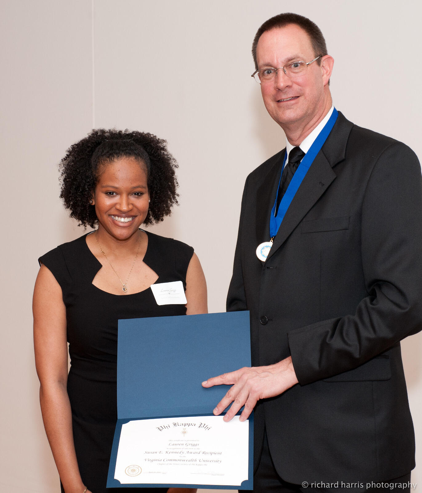 D’arcy Mays, Ph.D., chair of the Department of Statistical Sciences and Operations Research in the College of Humanities and Sciences, presents Lauren Griggs with the Susan E. Kennedy Memorial Scholarship.