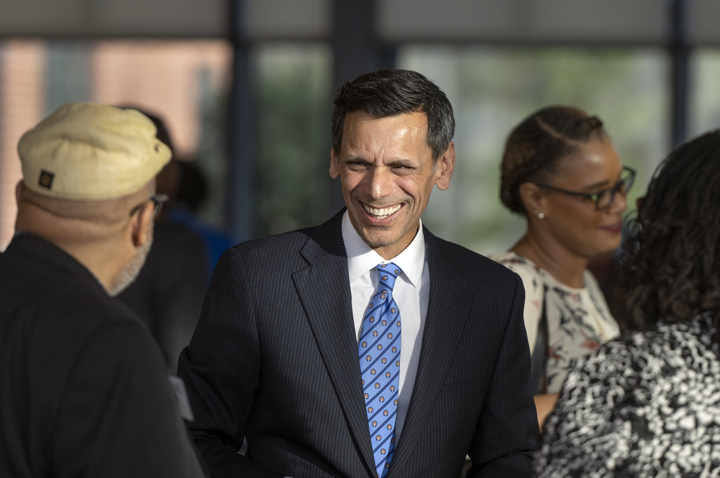 President Rao smiling at a person on his left. 
