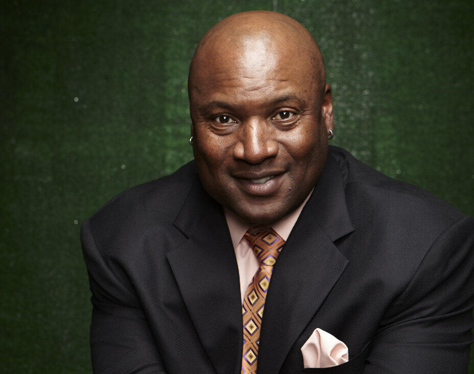 A photo of a man wearing a suit and tie. 