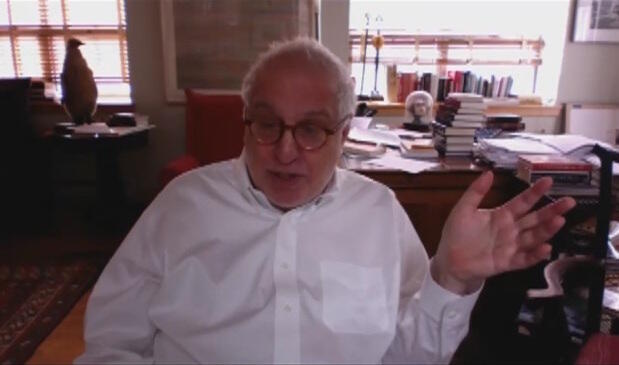 A screenshot of Errol Morris speaking in a videoconference session.