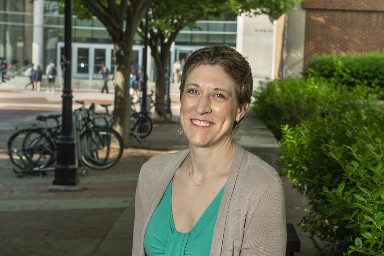 Jennifer Tillett sitting for a photo taken on campus