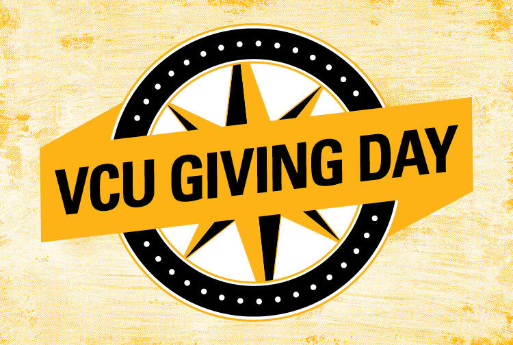 An illustration of a black and yellow compass with a yellow banner over it that says \"VCU GIVING DAY\" in black letters. 