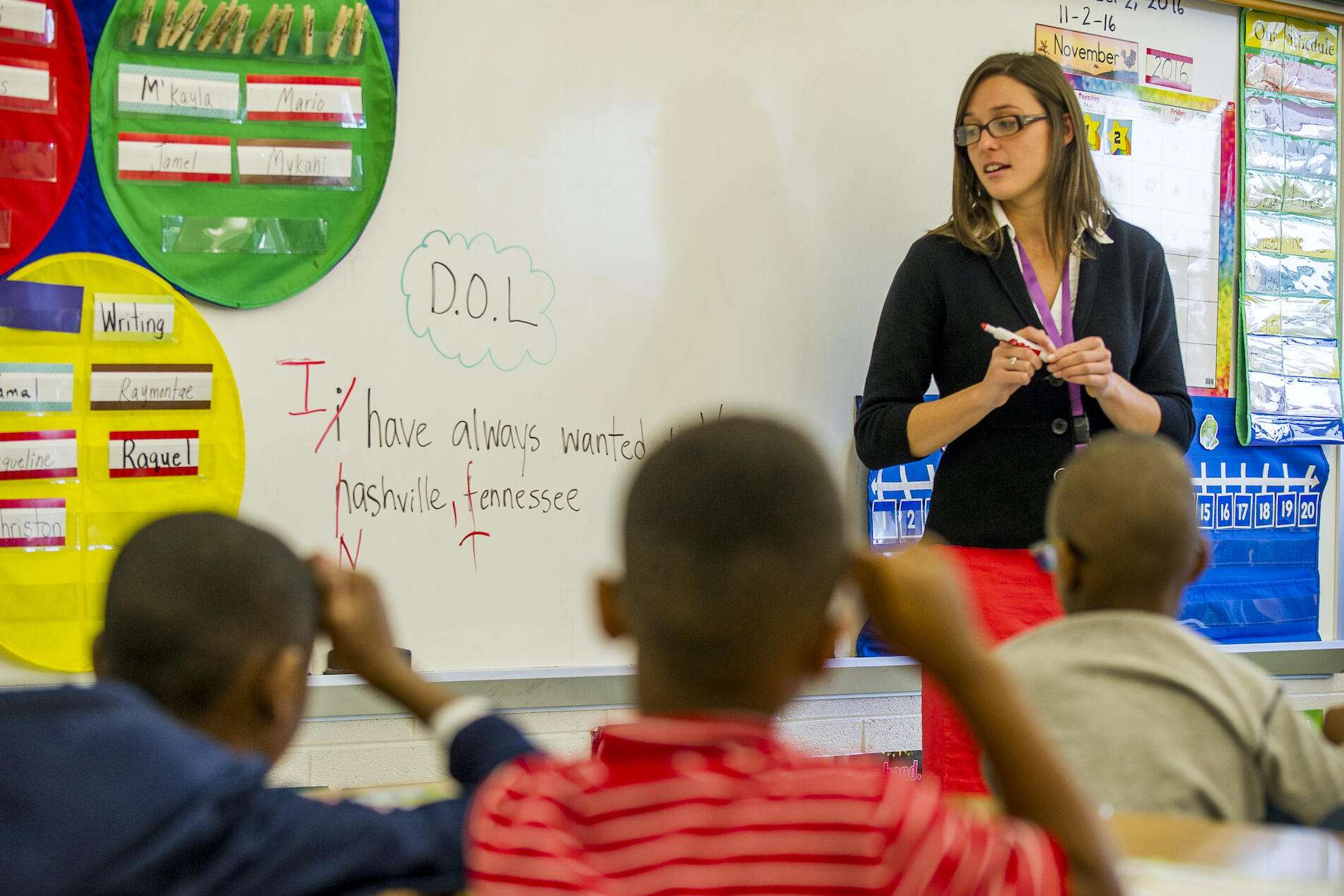 Grace Giampietro teaching in a classroom of students.
