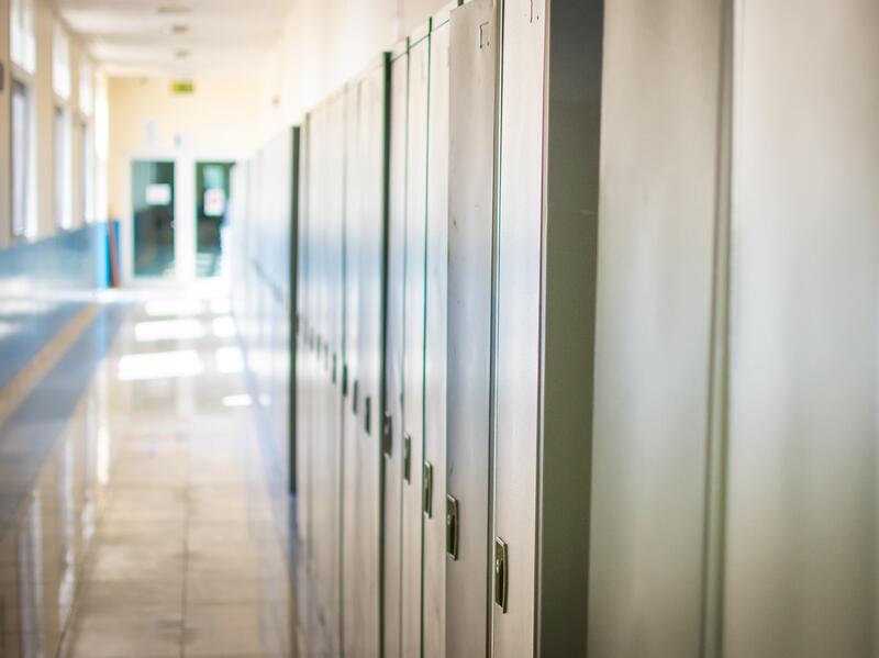 A school hallway with lockers.