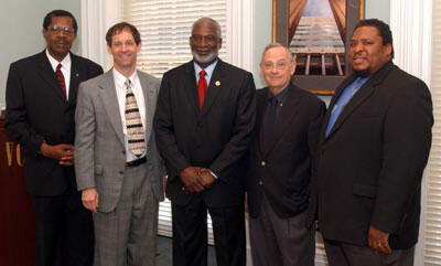 From left: Robert Satcher professor of chemistry at St. Paul's College in Lawrenceville, Dr. Sheldon Retchin, VCU vice president for health sciences and CEO, VCU Health System, Dr. David Satcher, Dr. Eugene Trani, VCU president and chair of the VCU Health System Board of Directors, and Dr. Wally Smith, associate professor and chair of VCU's Division of Quality Health meet to discuss minority health disparities and public health issues.

Photos by Jennifer Watson, VCU Creative Services