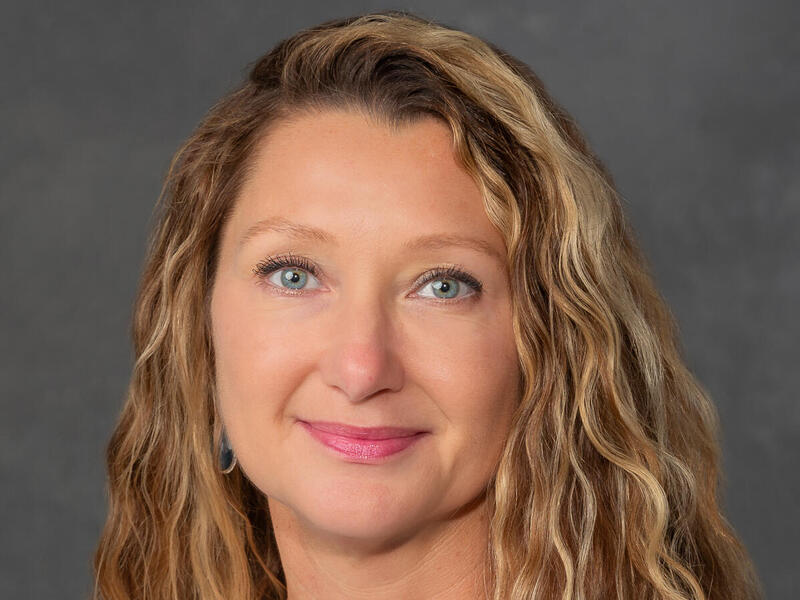 A photo of a woman from the shoulders up