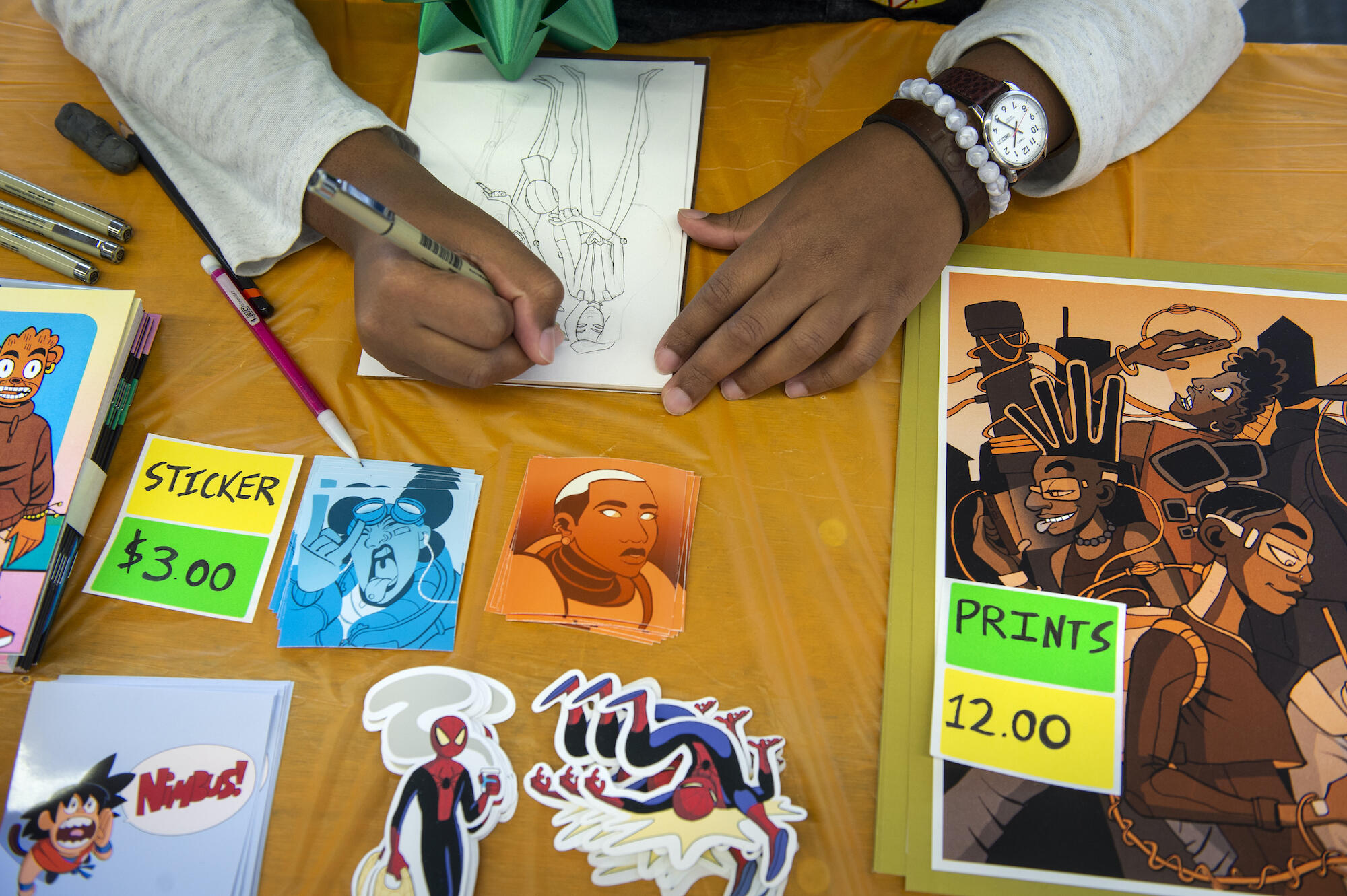 Ky Williams, who graduated from VCU with a degree in communication arts in May 2020, works on sketches.