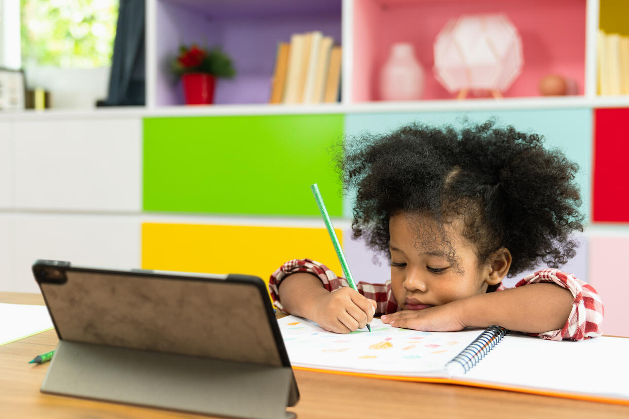 child doing schoolwork from home