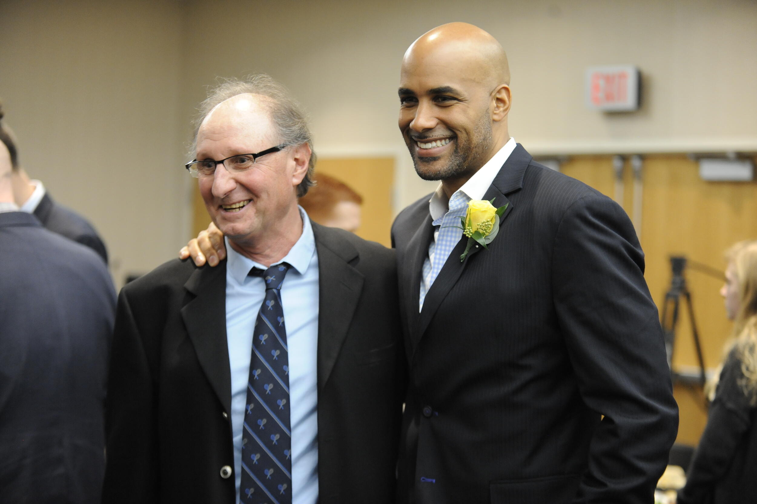 Kodjoe, right, pictured with VCU tennis coach Paul Kostin at Kodjoe's induction into the VCU Athletics Hall of Fame in 2017. (Photo credit: VCU Athletics)