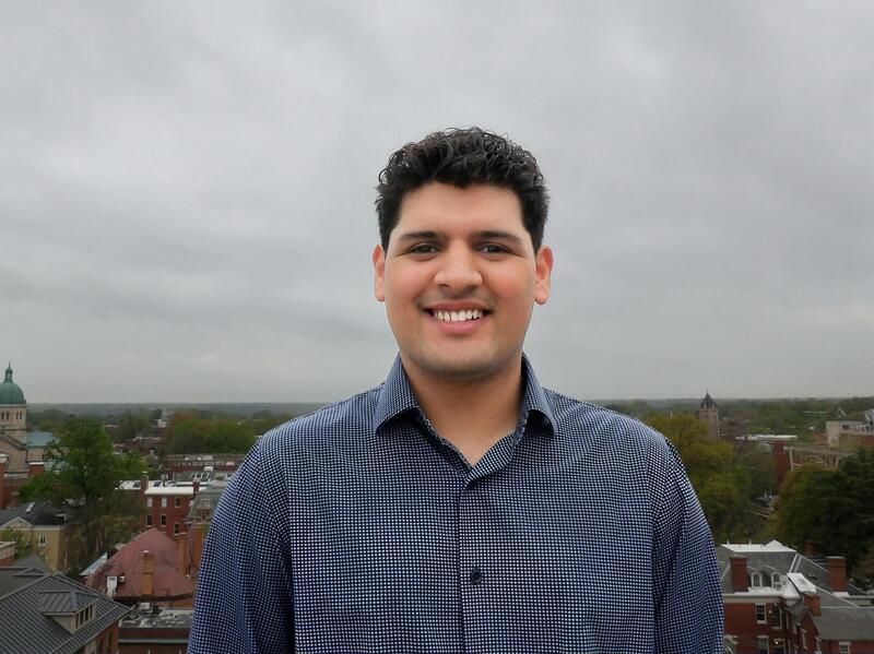 A photo of a man from the chest up. 