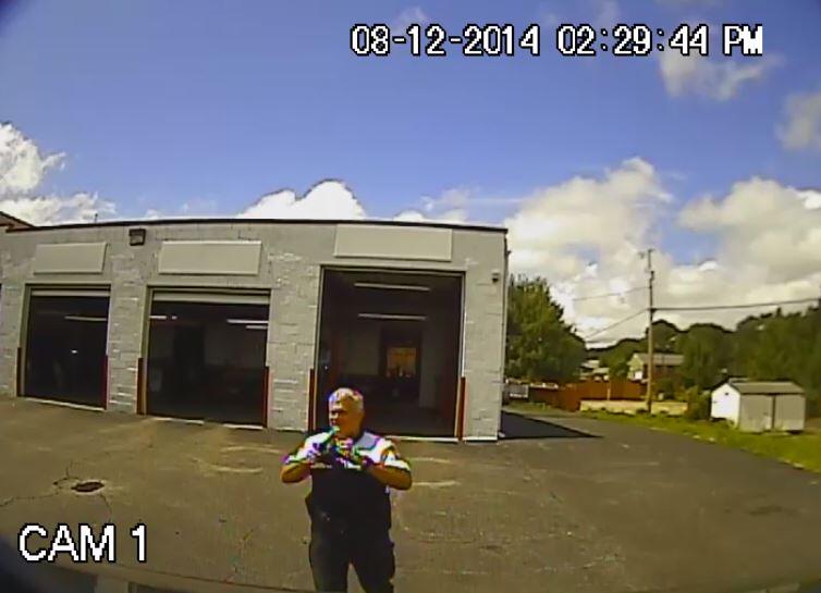 VCU Police Ofc. Greg Felton, the department’s external relations officer, demonstrates how cameras on a new noise suppression vehicle capture images on video recording equipment.